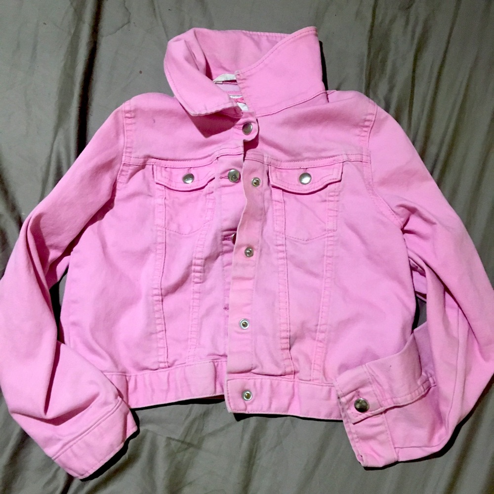 Pink jean jacket.